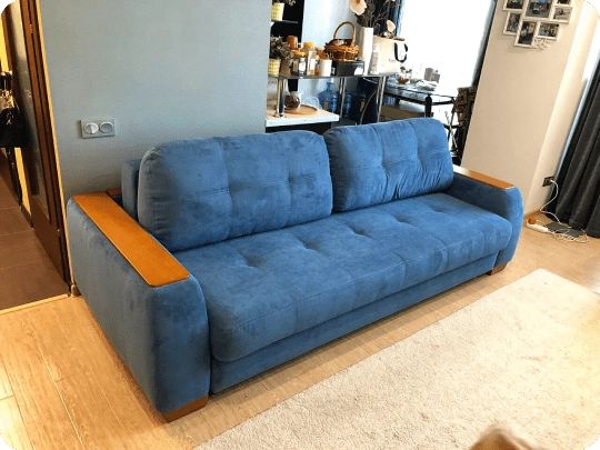 The same sofa recovered in blue fabric