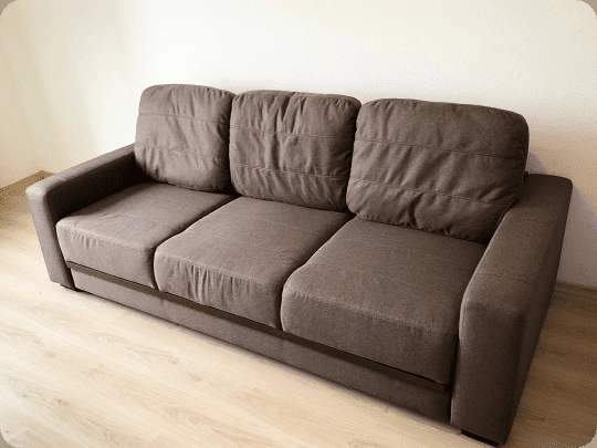 The same sofa recovered in brown fabric