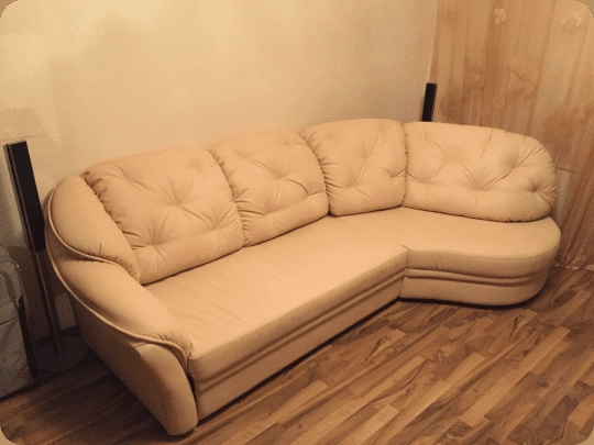 The same corner sofa recovered in cream leather