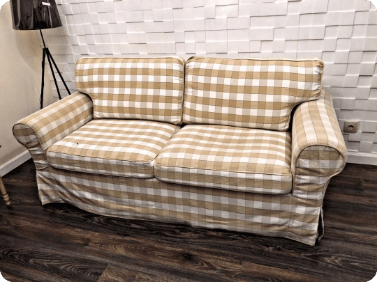Checked cotton loveseat before reupholstery