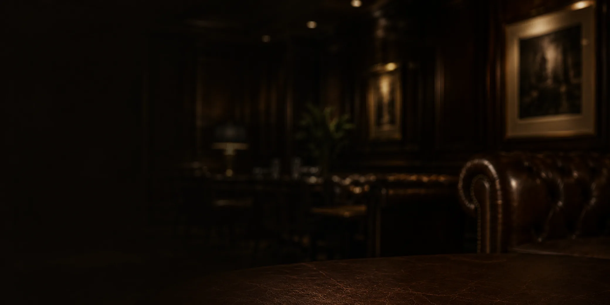 Dark office lounge with leather seating after hours