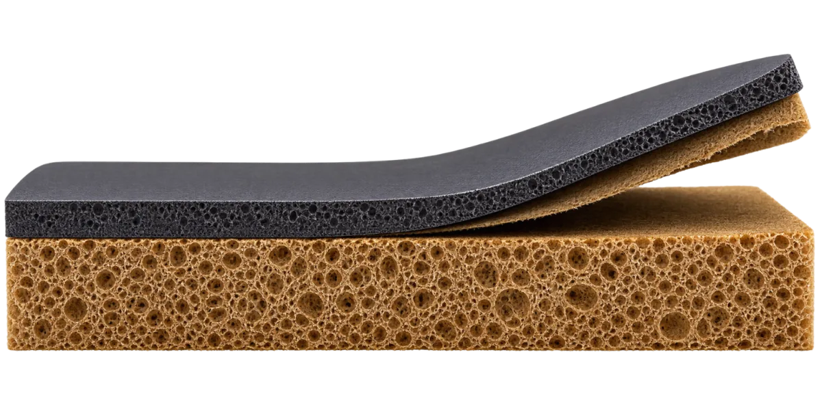 Diagram of a surface layer curling off a foam base