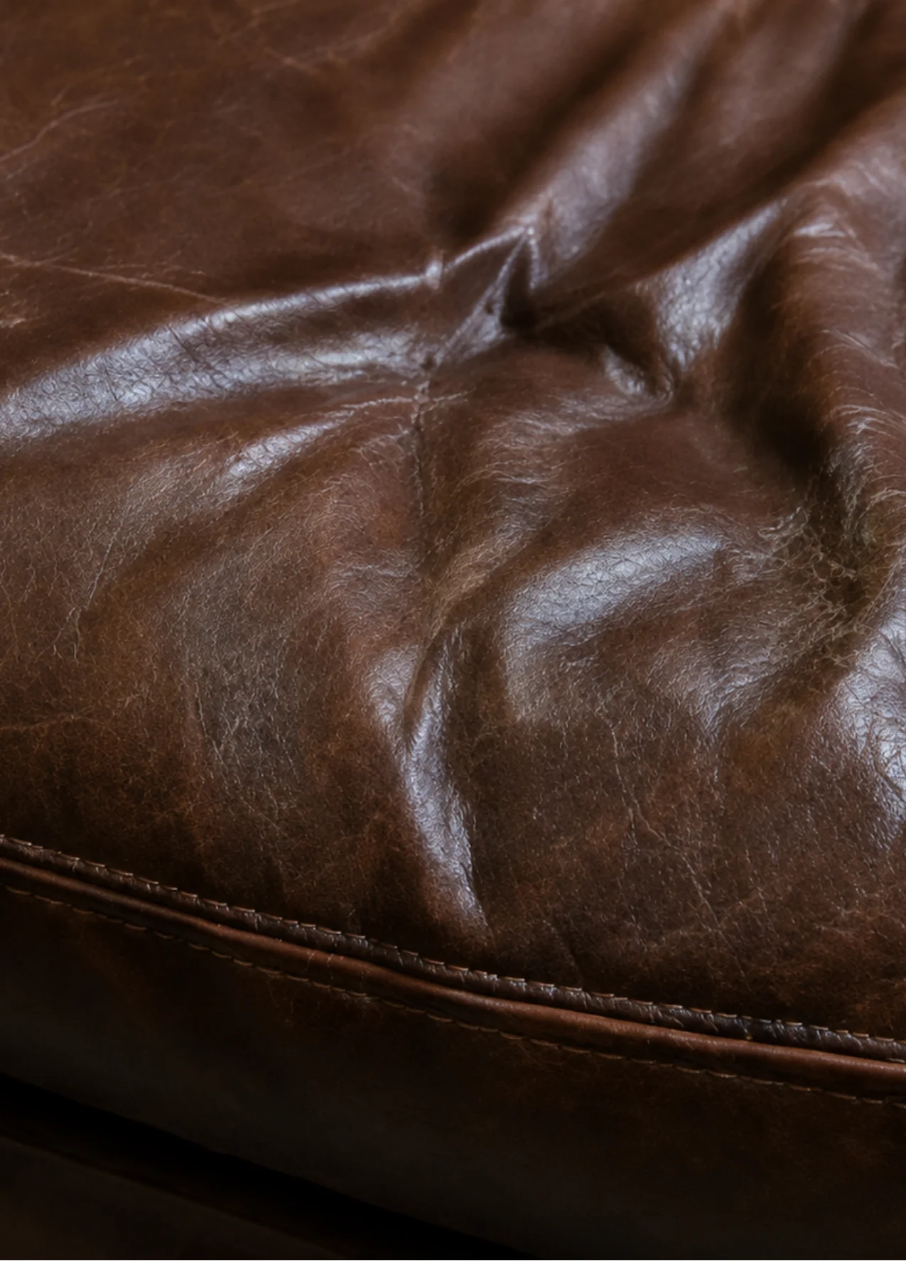 Worn faded leather before repair