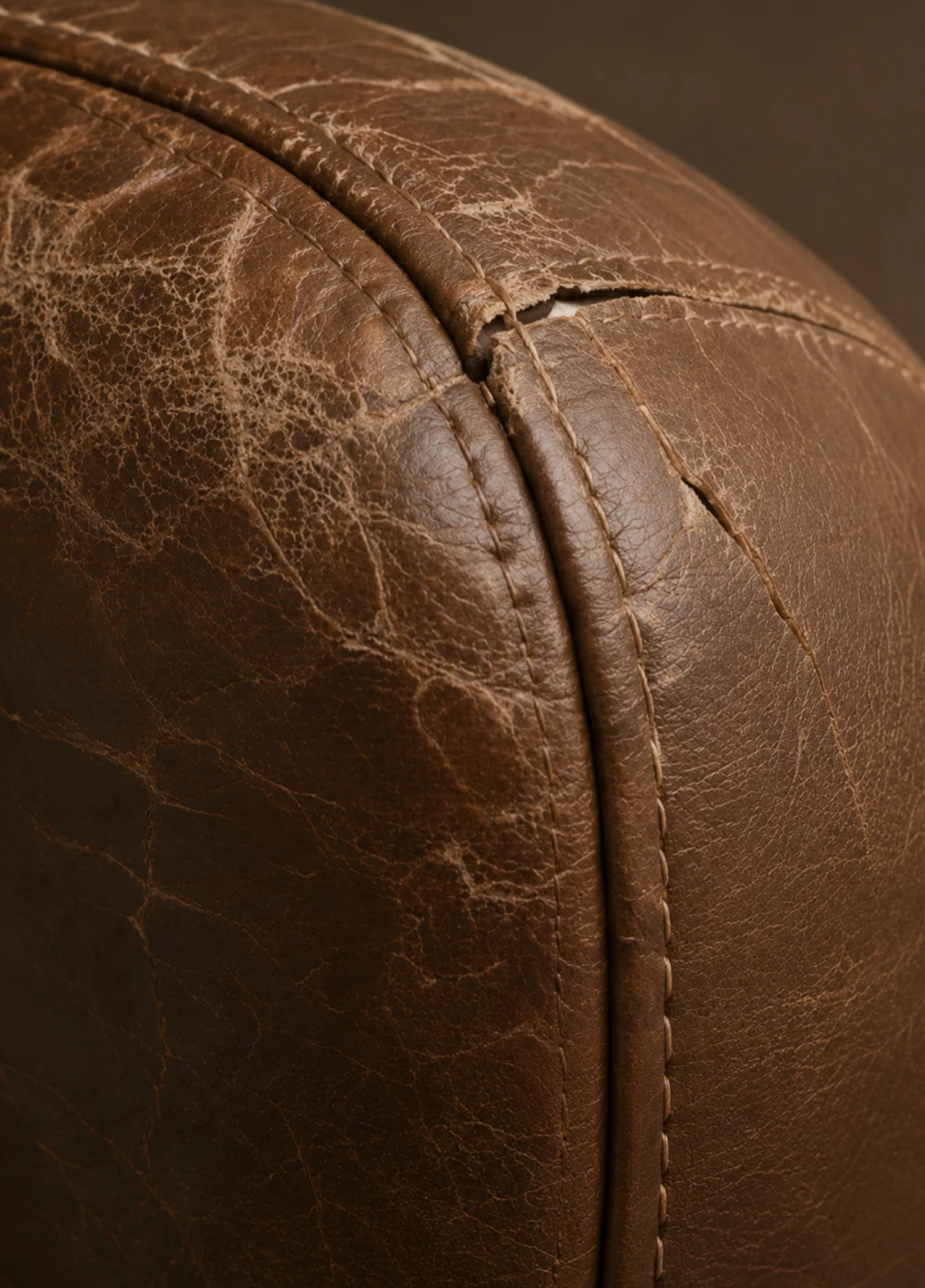 Leather cracking damage before repair