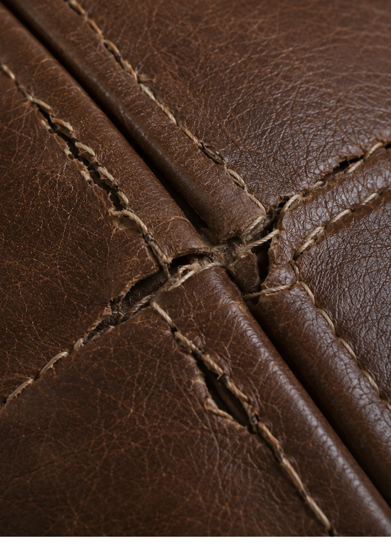 Leather broken stitching before repair