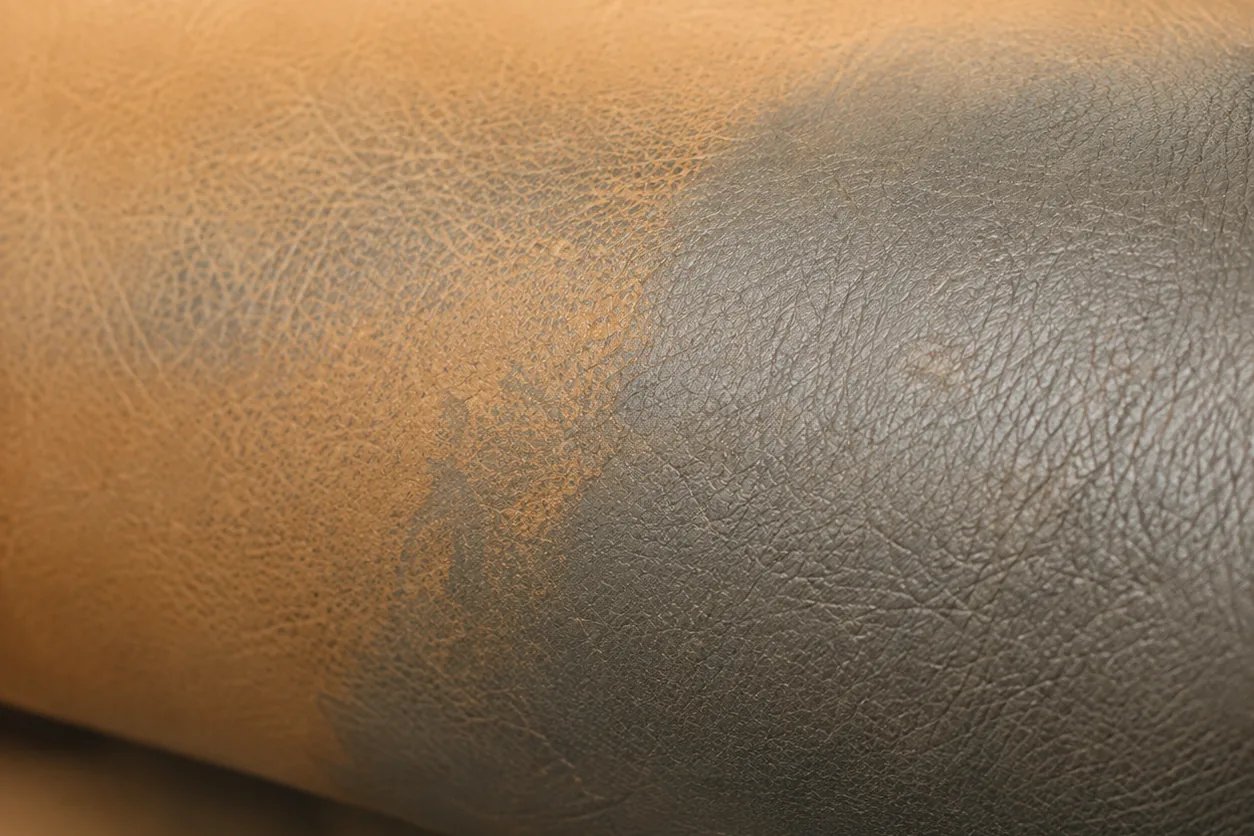 Restaurant leather seat faded to two uneven tones