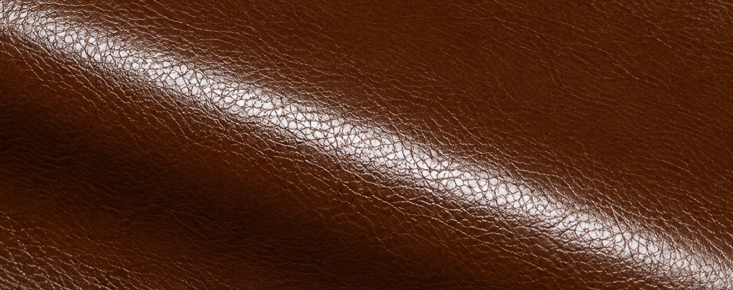 Glossy brown leather