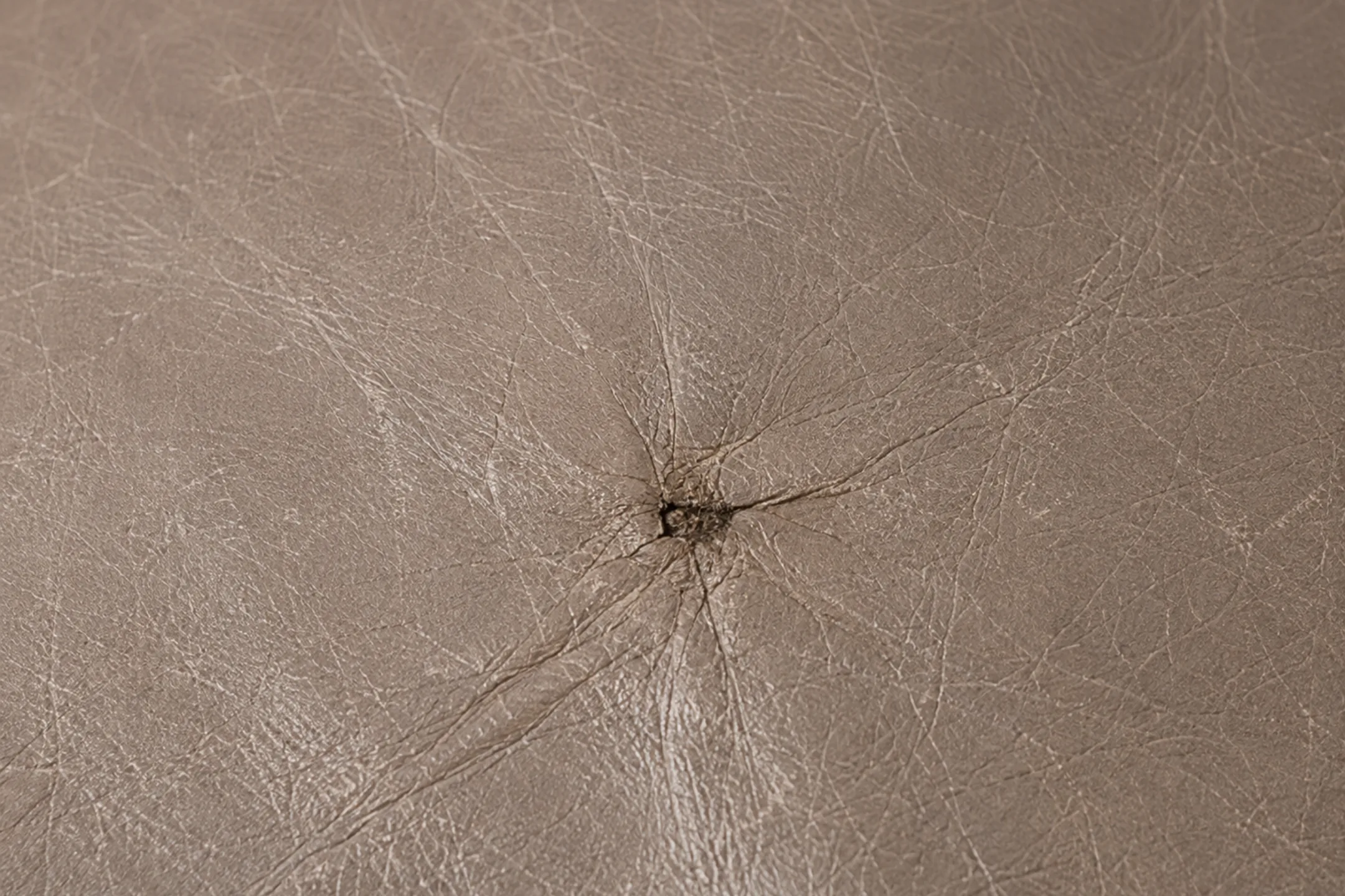 Surface wear on pale leather