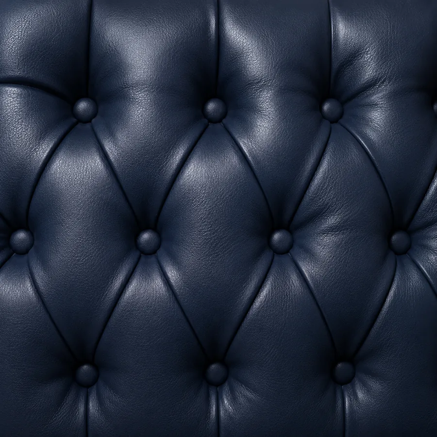 Navy leather seat back in deep buttoned diamond tufting