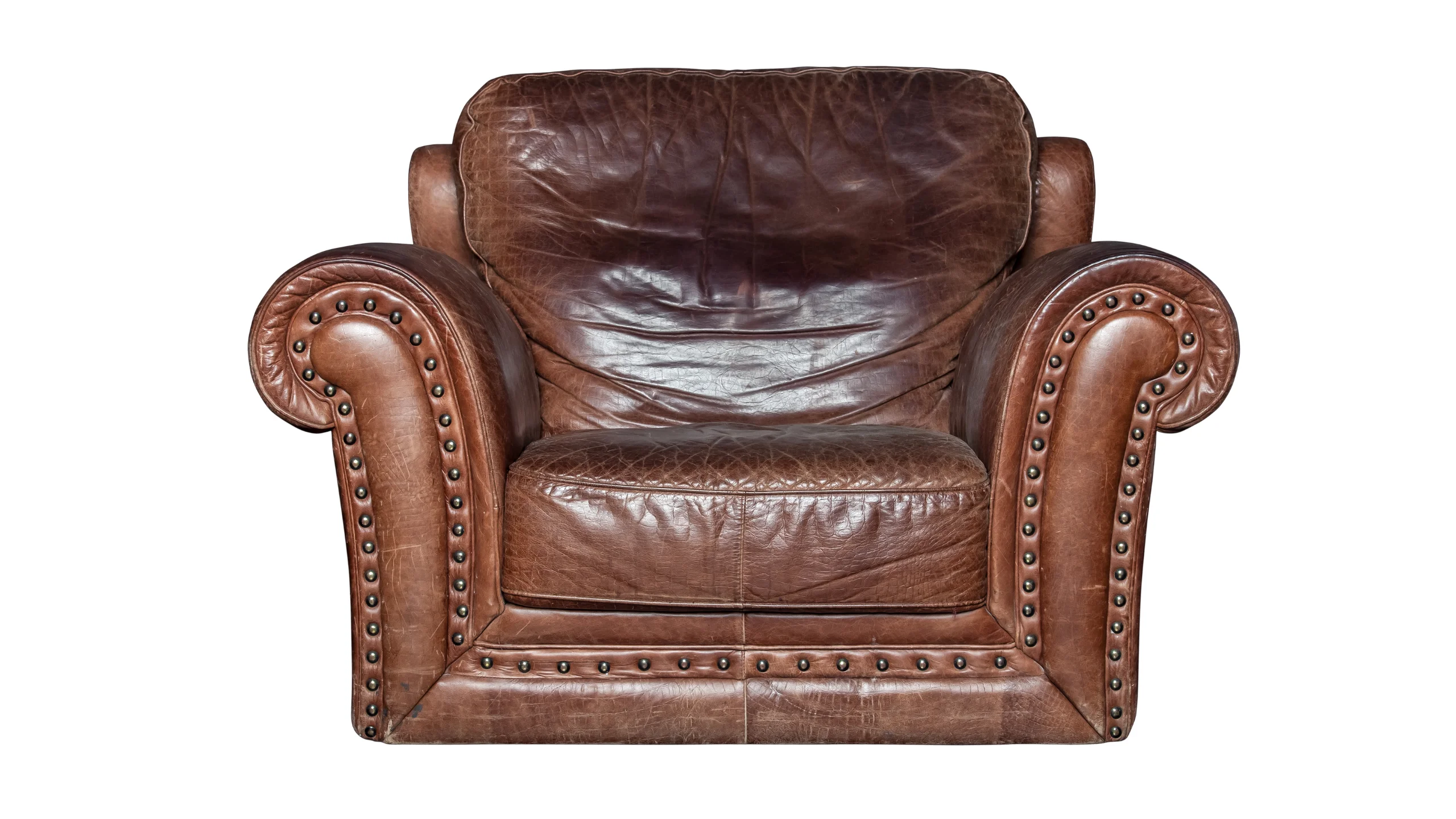Leather armchair worn across every panel