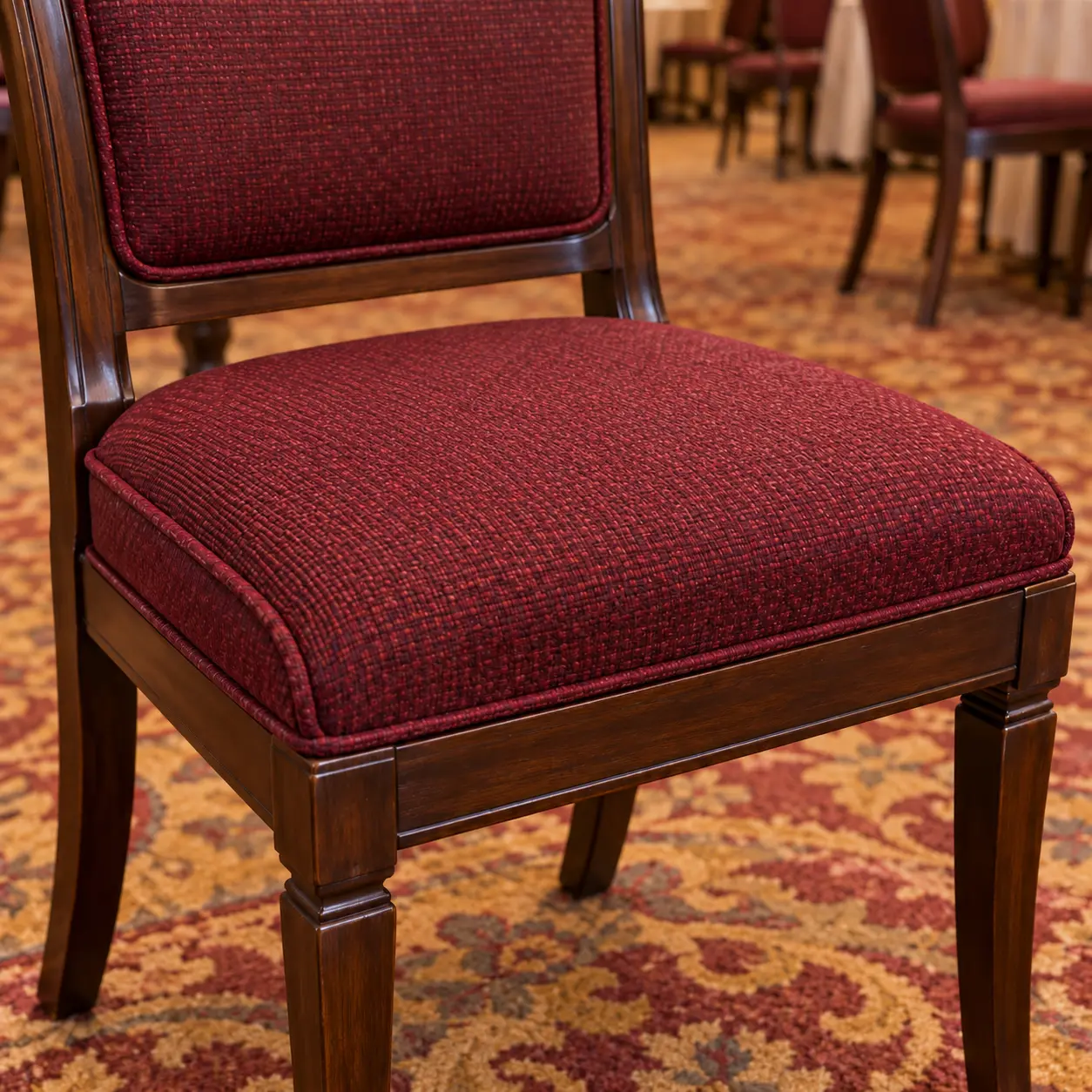 The same banquet chair seat fabric after restoration