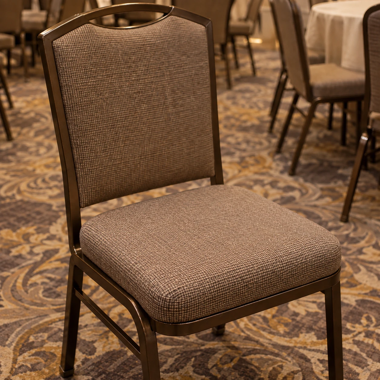 The same banquet chair seat after reupholstery