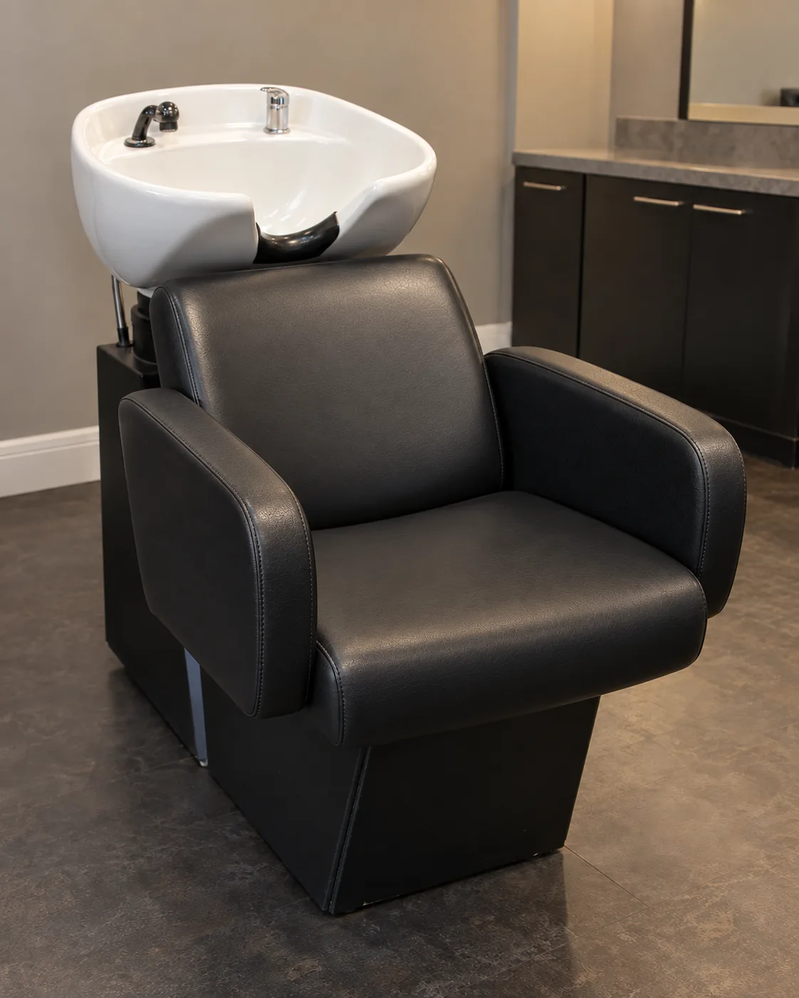 The same shampoo chair with a new black seat
