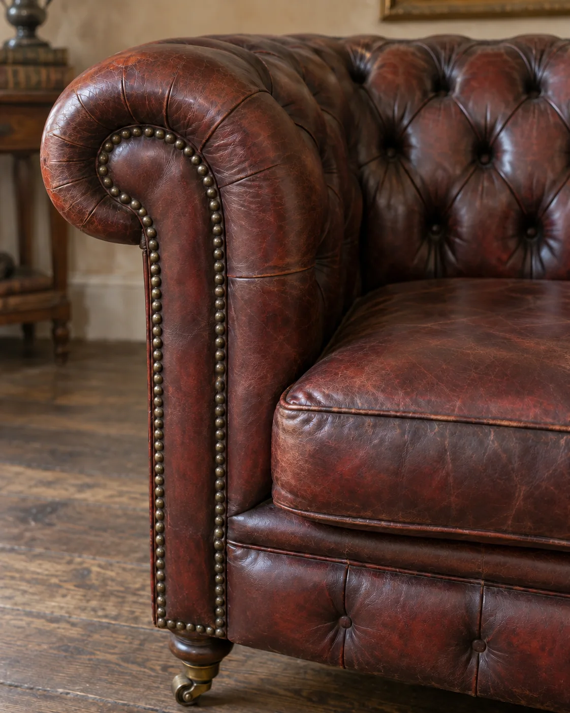 The same Chesterfield arm restored with its patina kept