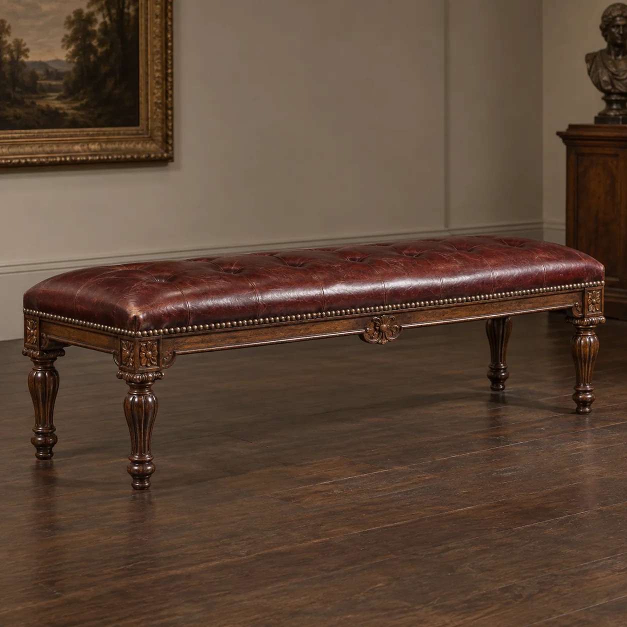An antique leather-topped bench
