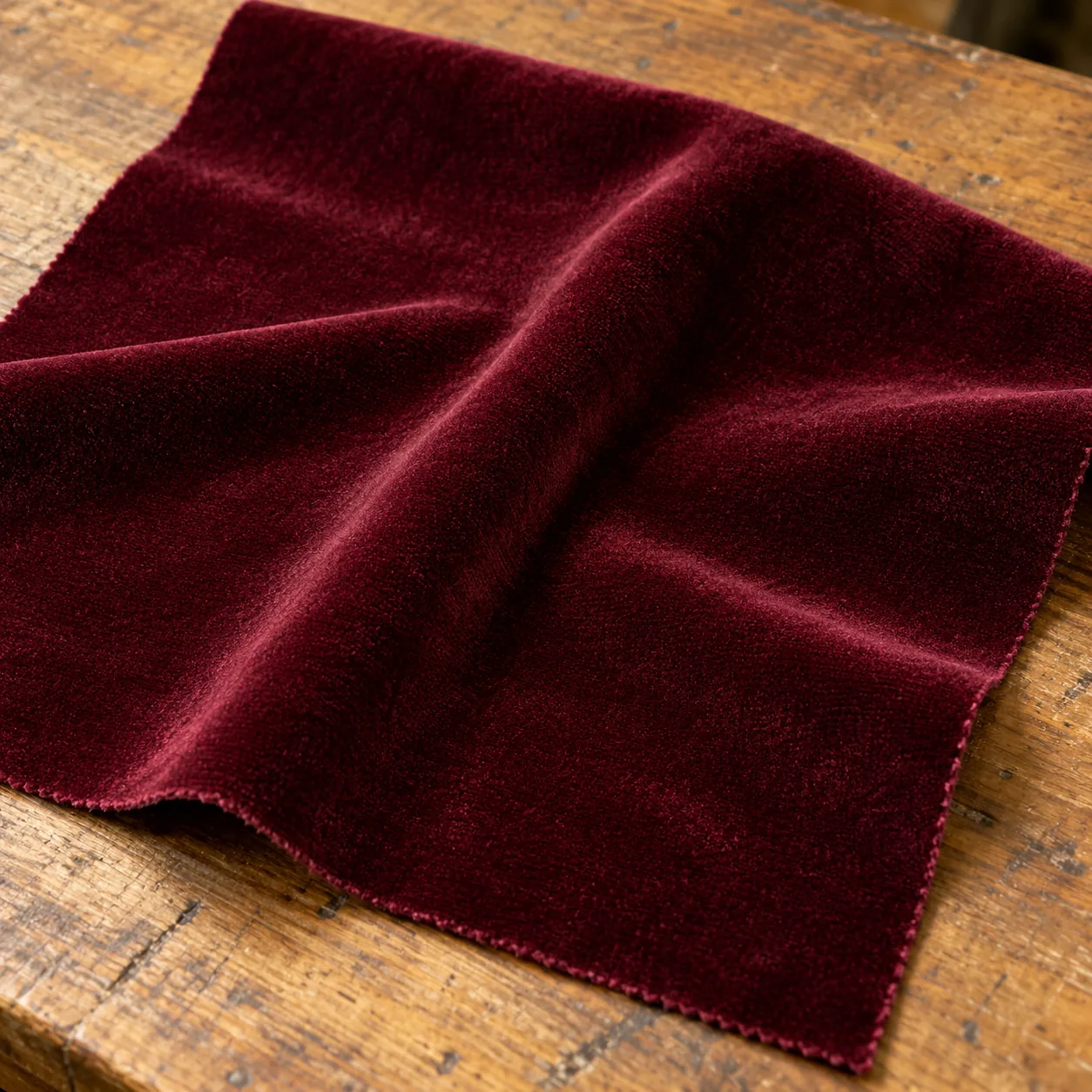 A close-up of velvet upholstery fabric