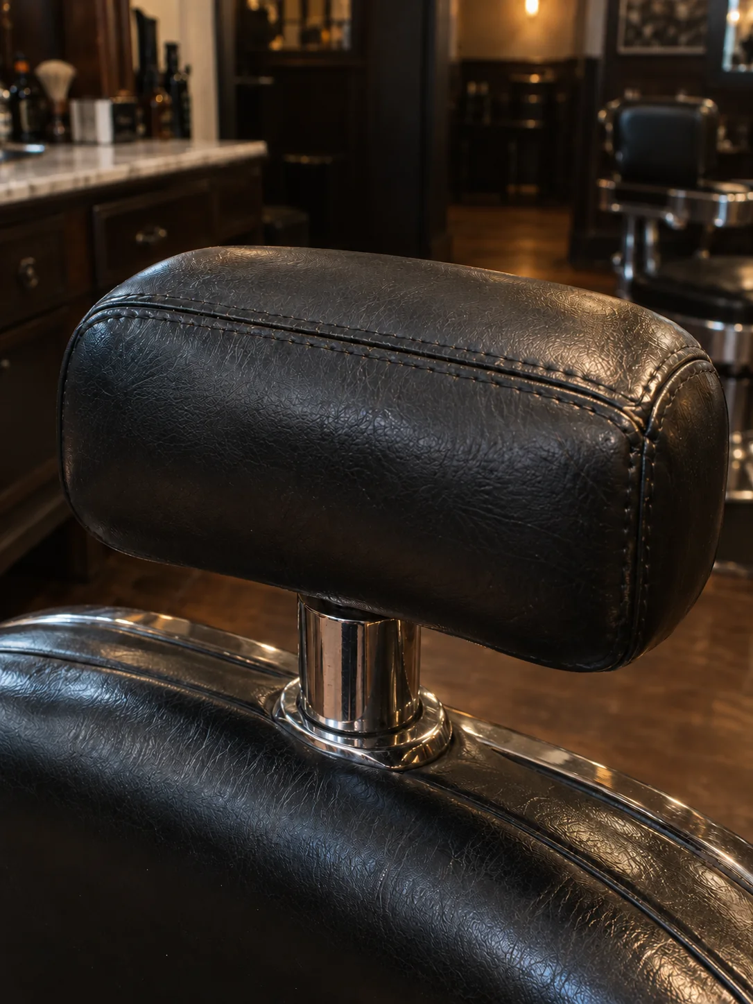 After: the same barber chair headrest repaired, same angle