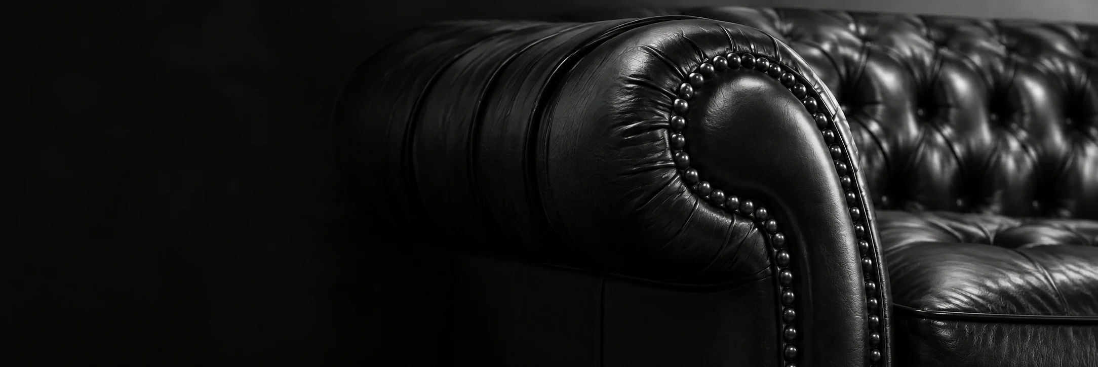Sealed black chesterfield arm