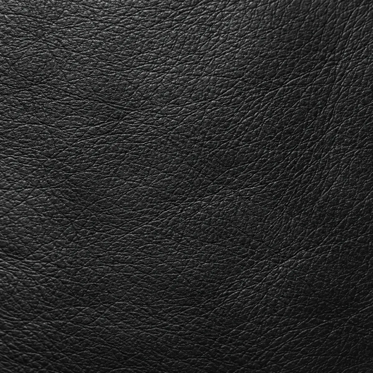 Close view of black leather grain