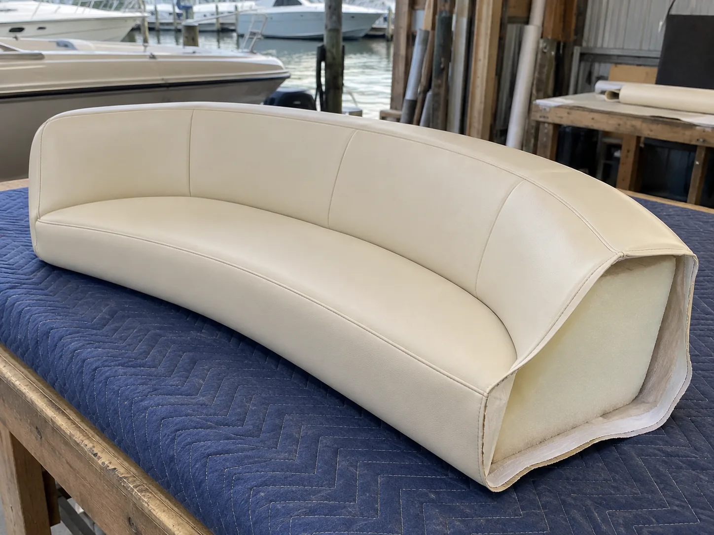 A new cover fitted over boat cushion foam with squared corners