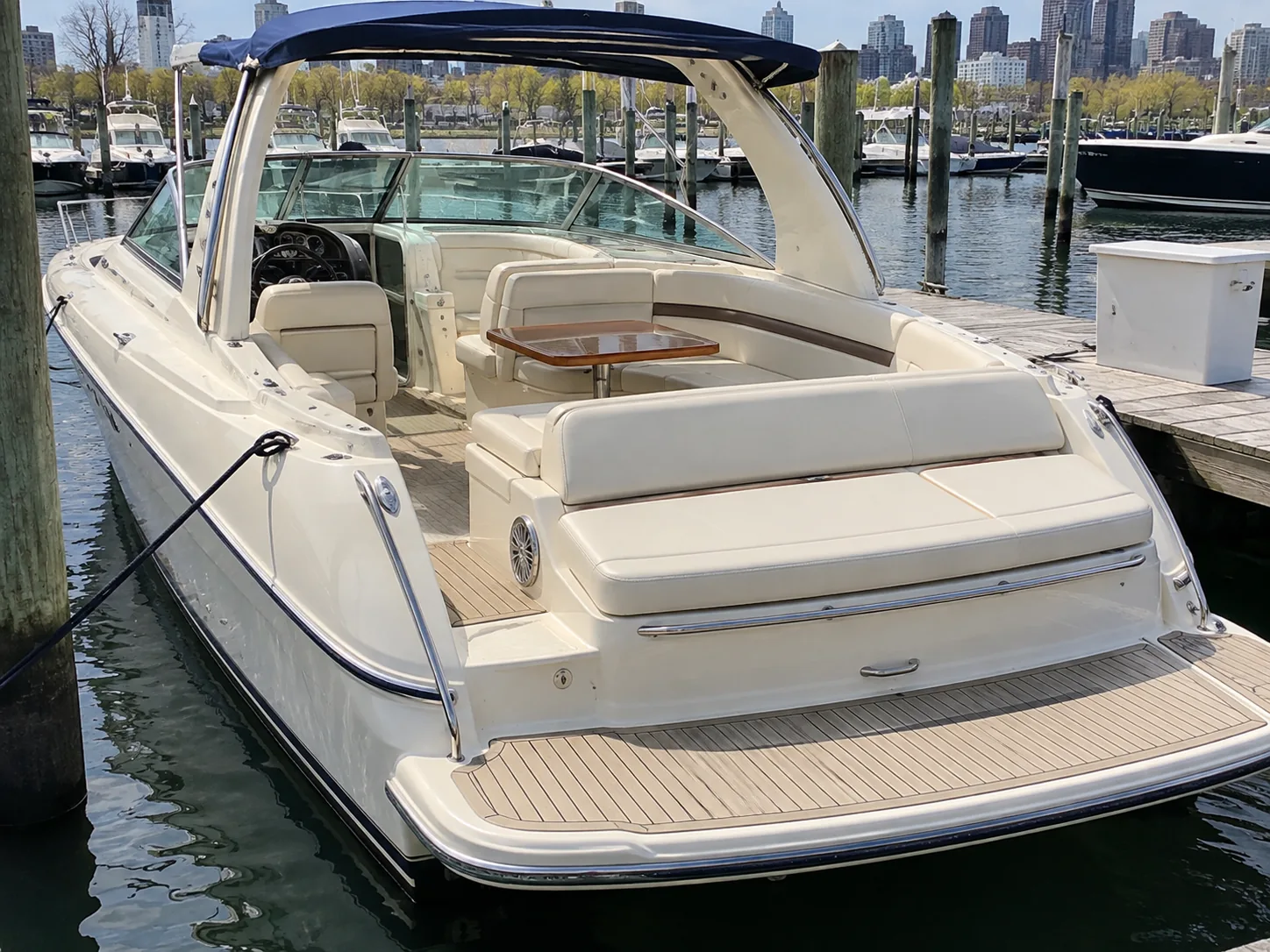 A boat back in its slip in spring with finished seating