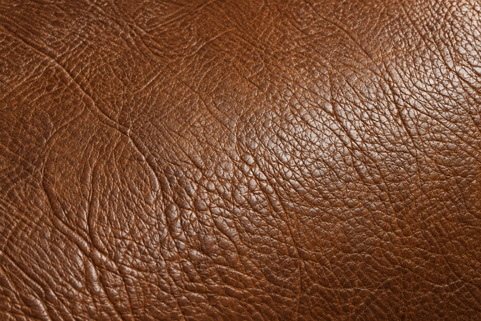 Furniture repair Hackensack NJ: the natural grain of brown leather up close