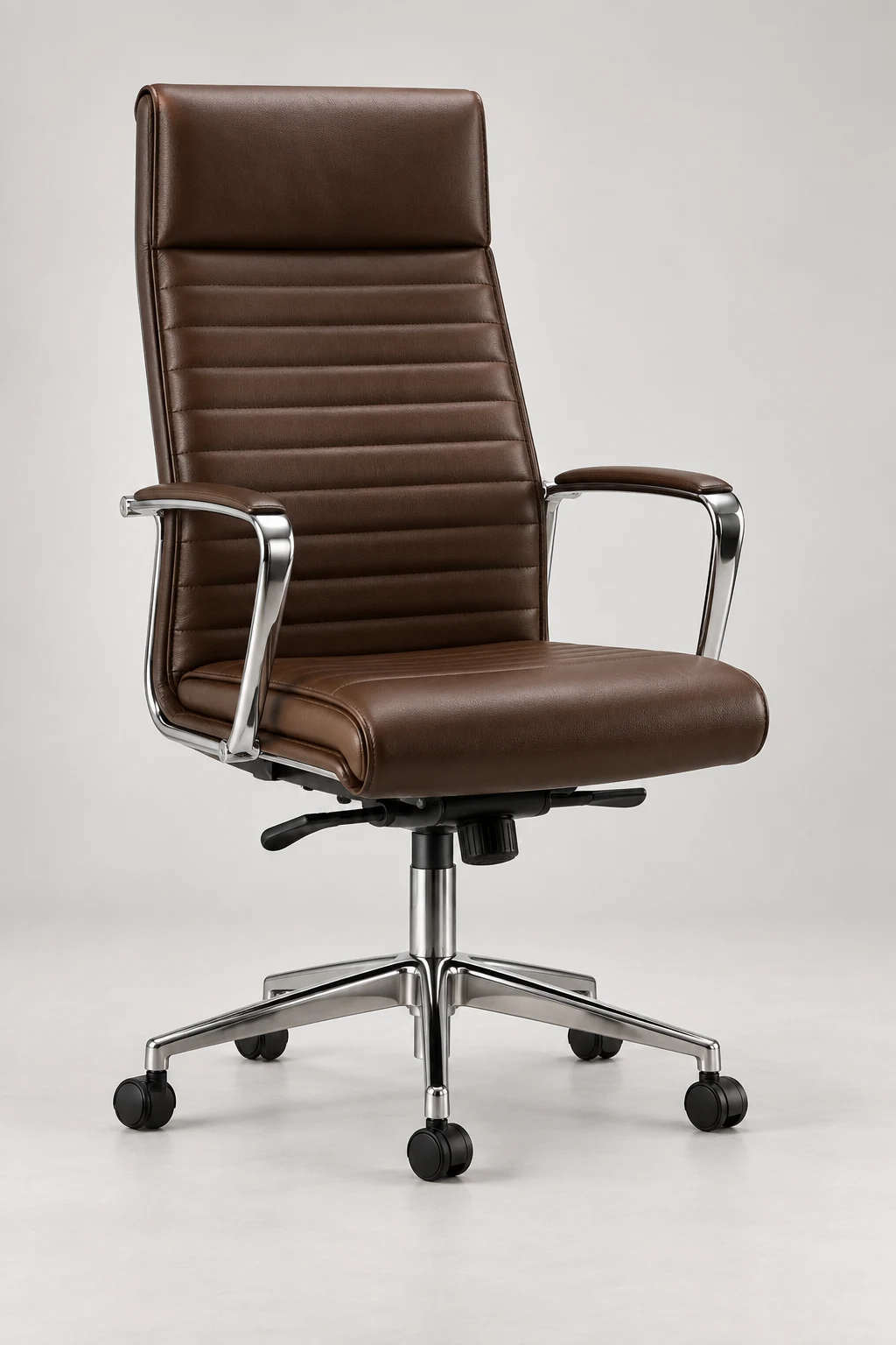 Brown ribbed leather executive office chair with chrome arms and a five-star base