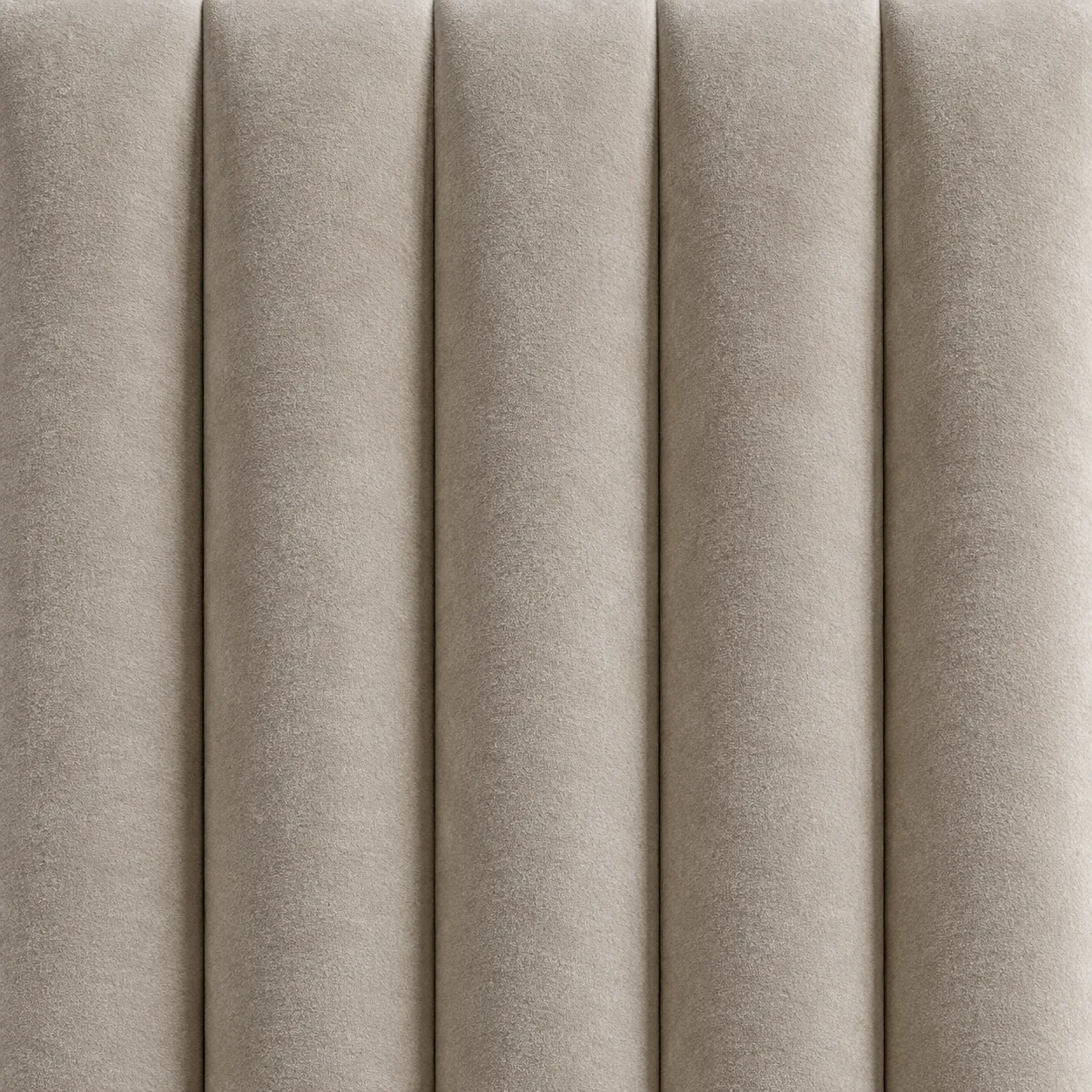 Channel tufting built in even flutes across a taupe velvet headboard face