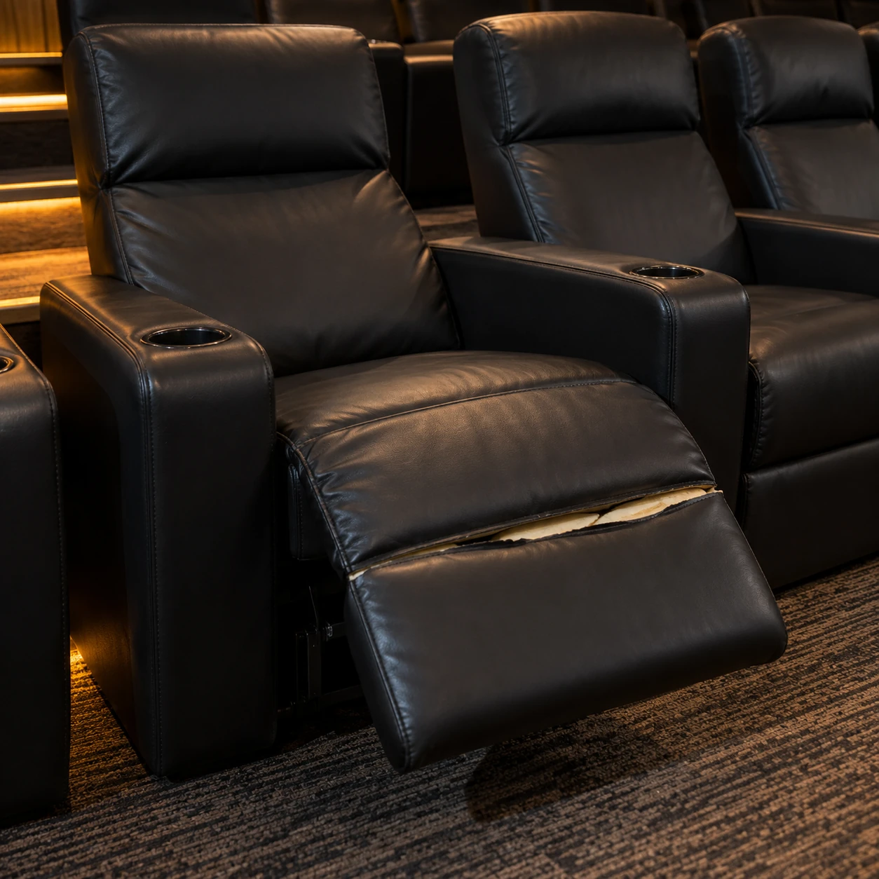 A split cinema recliner legrest before recovering