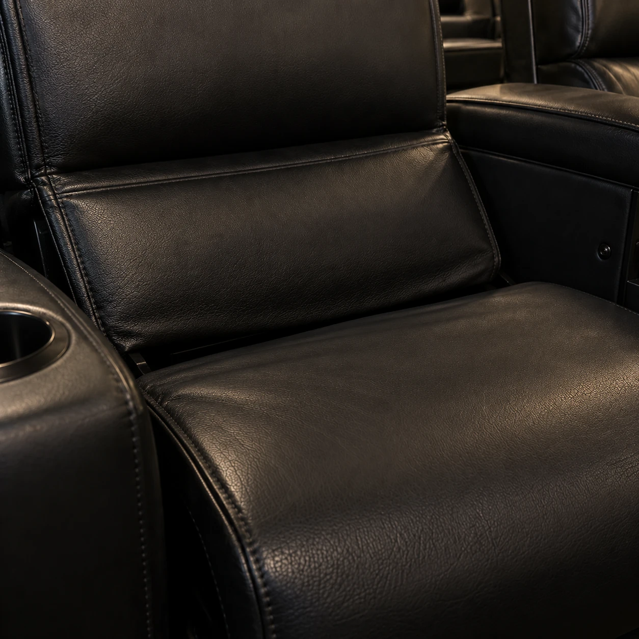 The seat-to-back seam on a cinema recliner