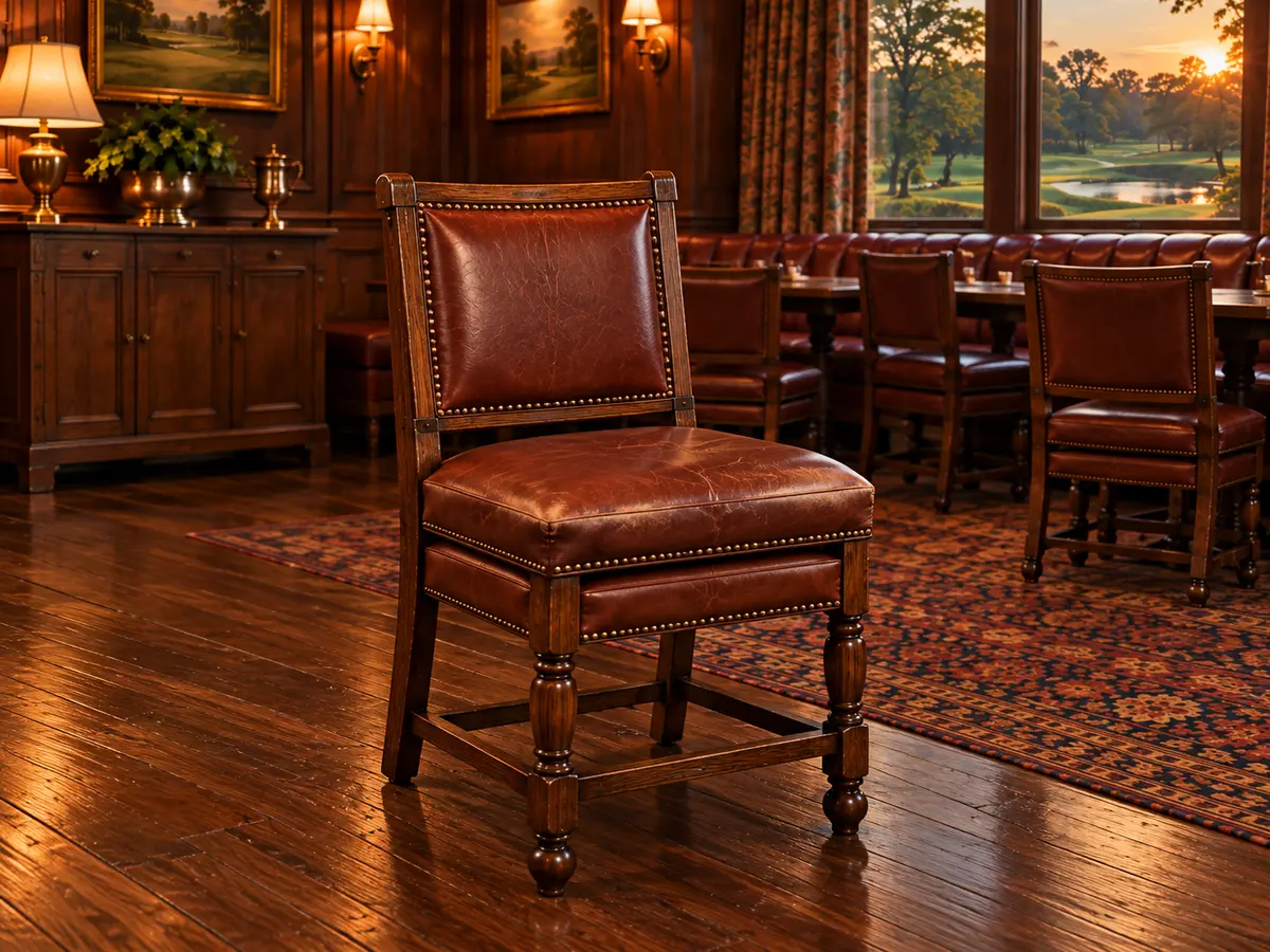 Before: a club dining chair with a scuffed, faded seat front