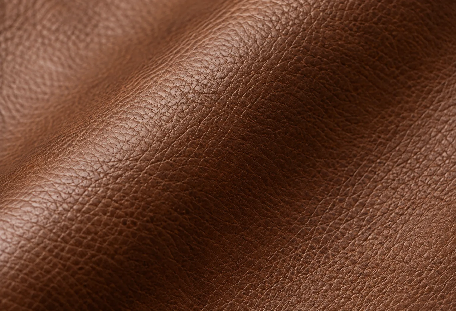 Cognac pebble-grain leather swatch for a headboard
