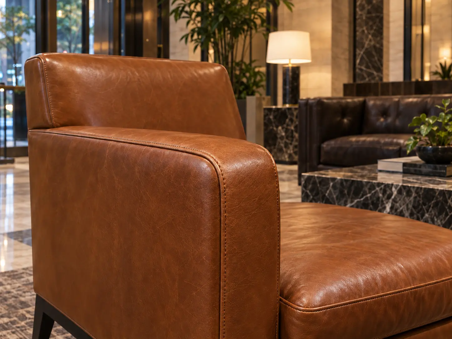 The same cognac leather lounge chair with the arm repaired and recolored