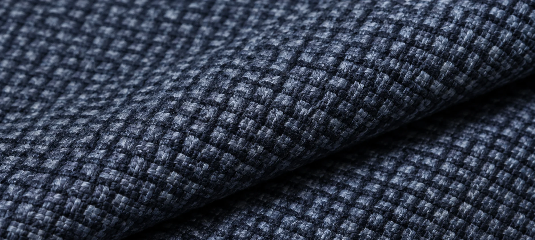 Navy contract performance fabric swatch folded to show the weave
