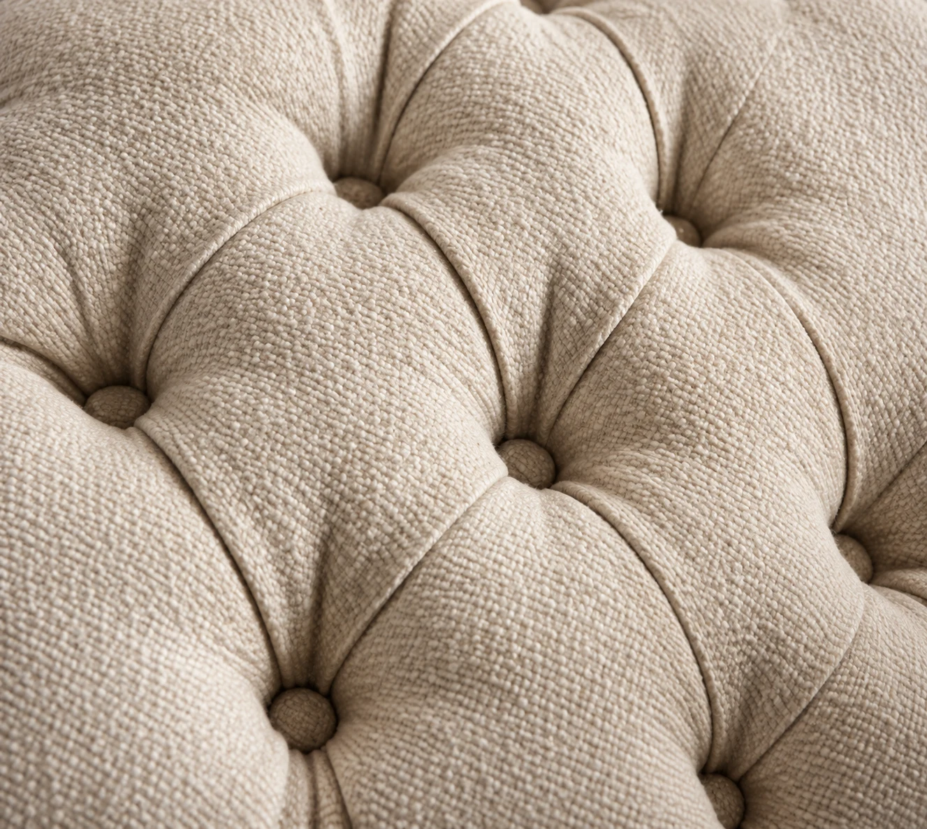 Cream boucle chair back with deep button tufting