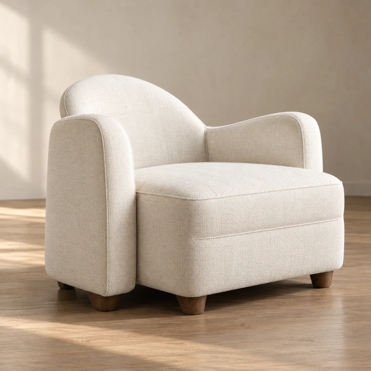 Cream armchair with a curved shape