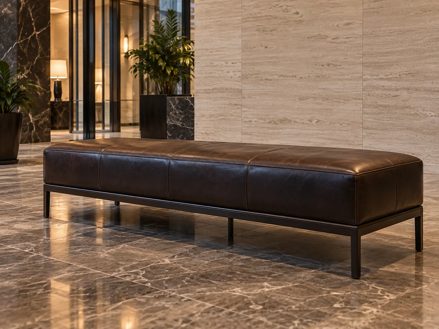A dark brown leather bench in a lobby