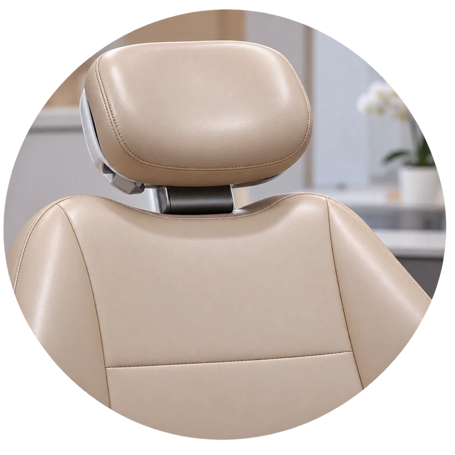 A repaired taupe dental chair headrest with an even finish