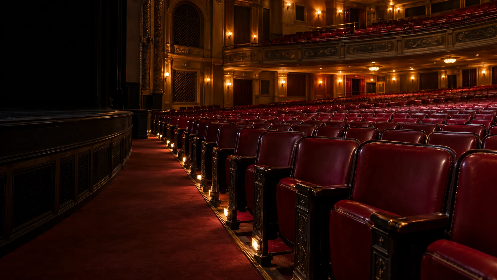 Entertainment venue seating repair NYC: rows of theater seating before doors open