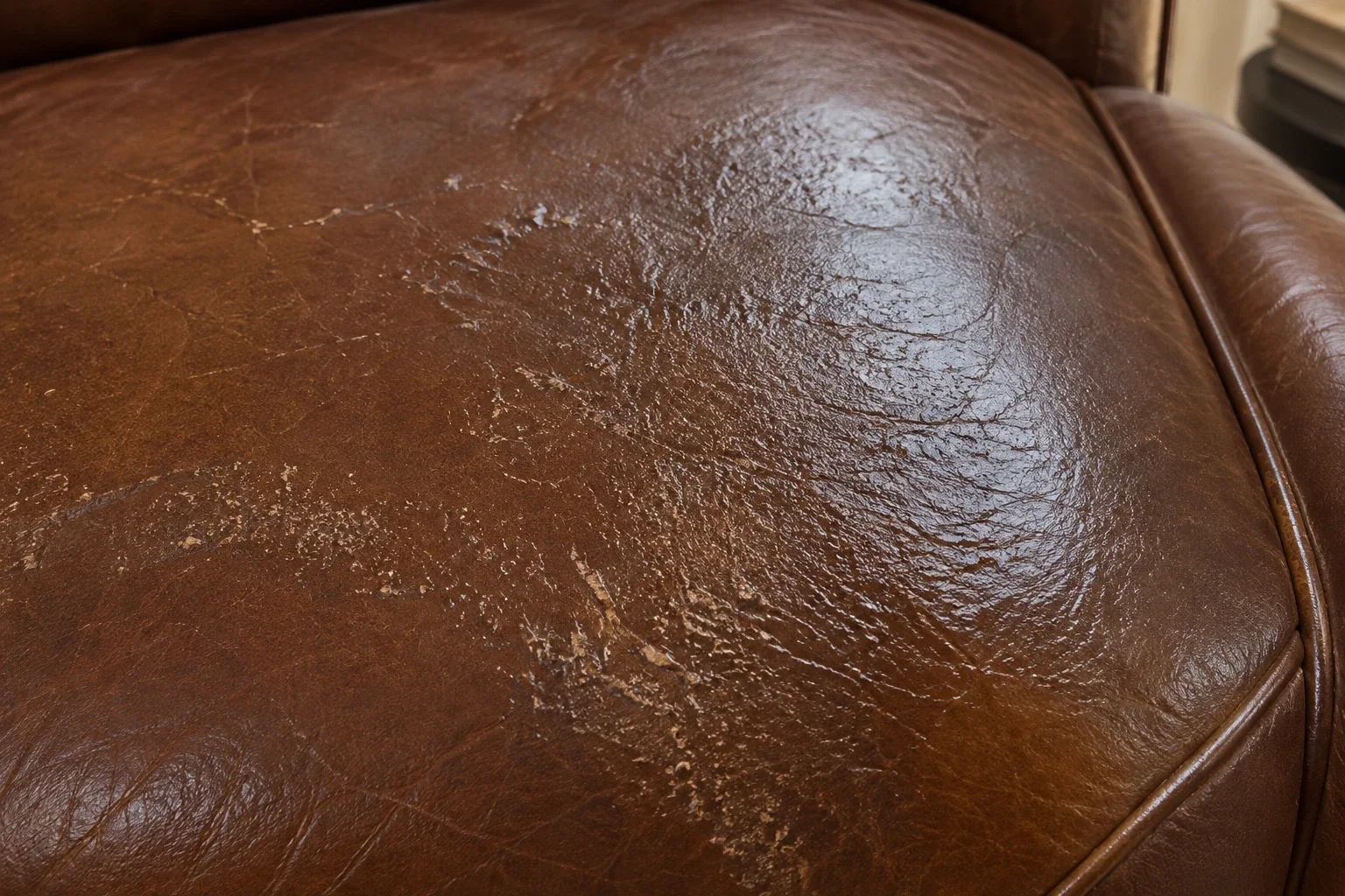 Dull patch where the sheen has worn