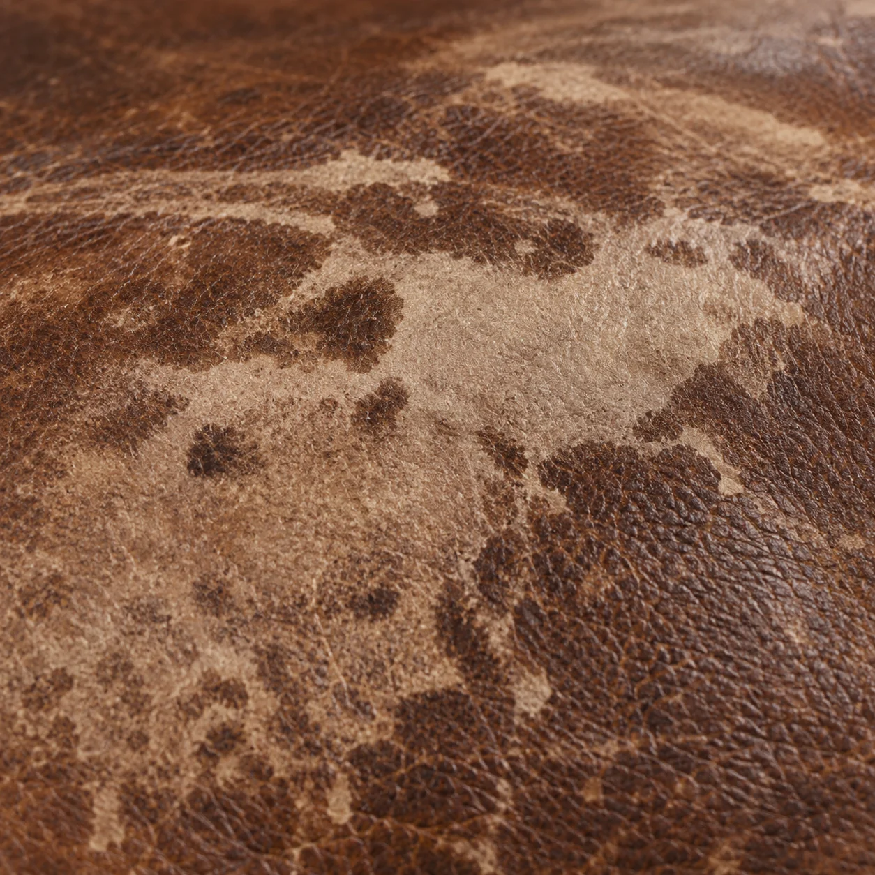 Leather finish worn through to the raw hide