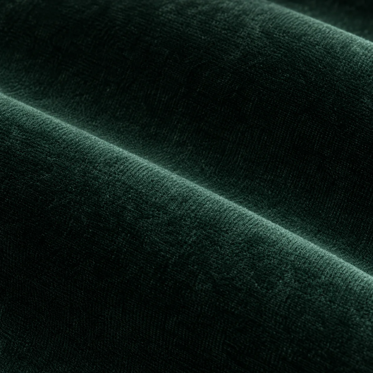 Deep forest green velvet upholstery