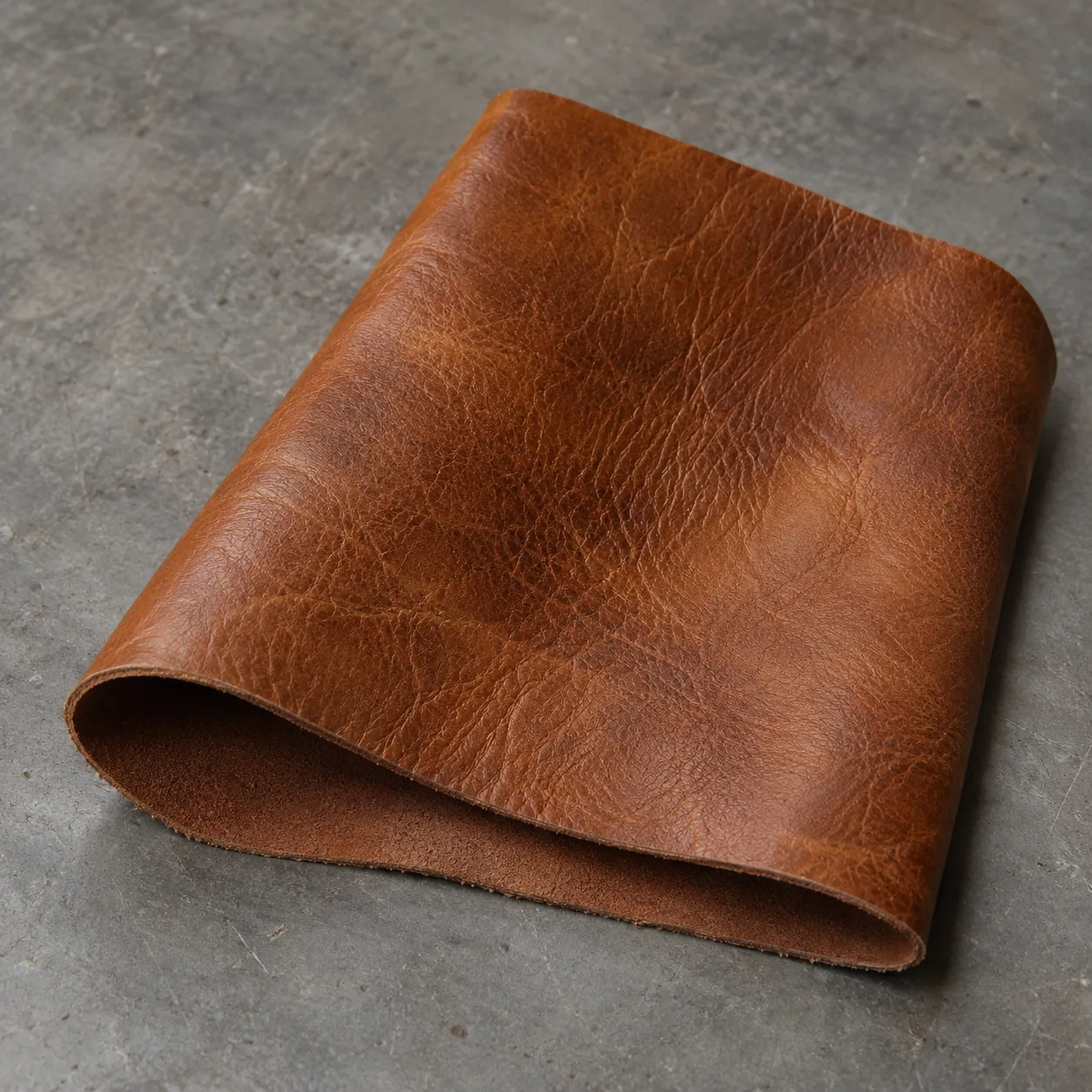 A swatch of cognac full-grain leather