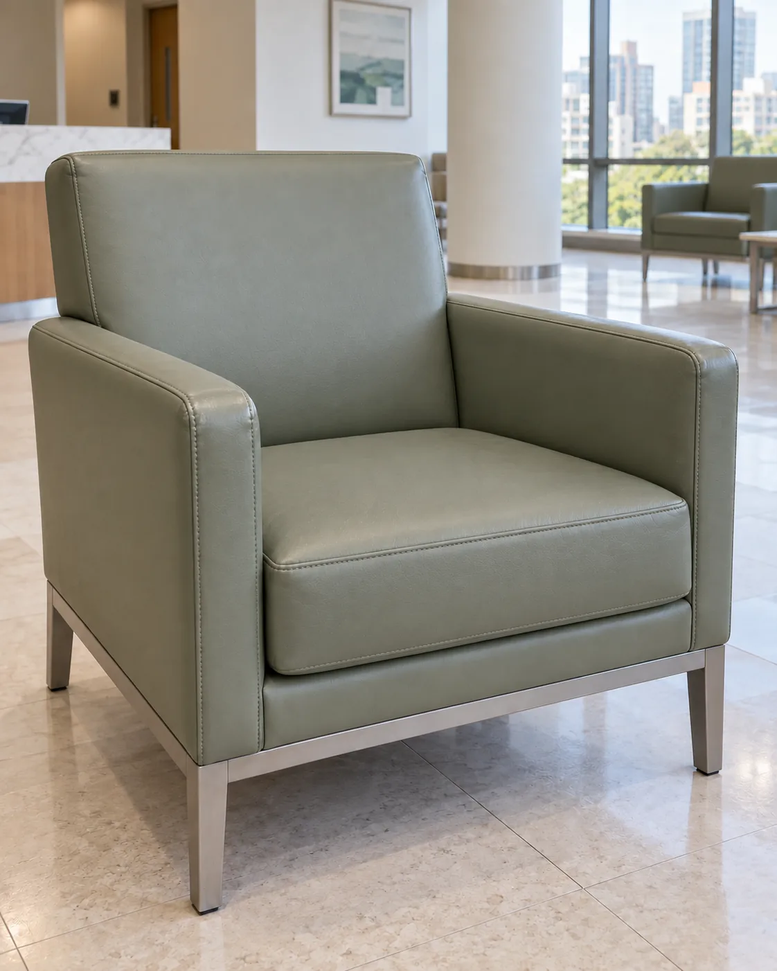 The same sage lounge chair after its seat was restored