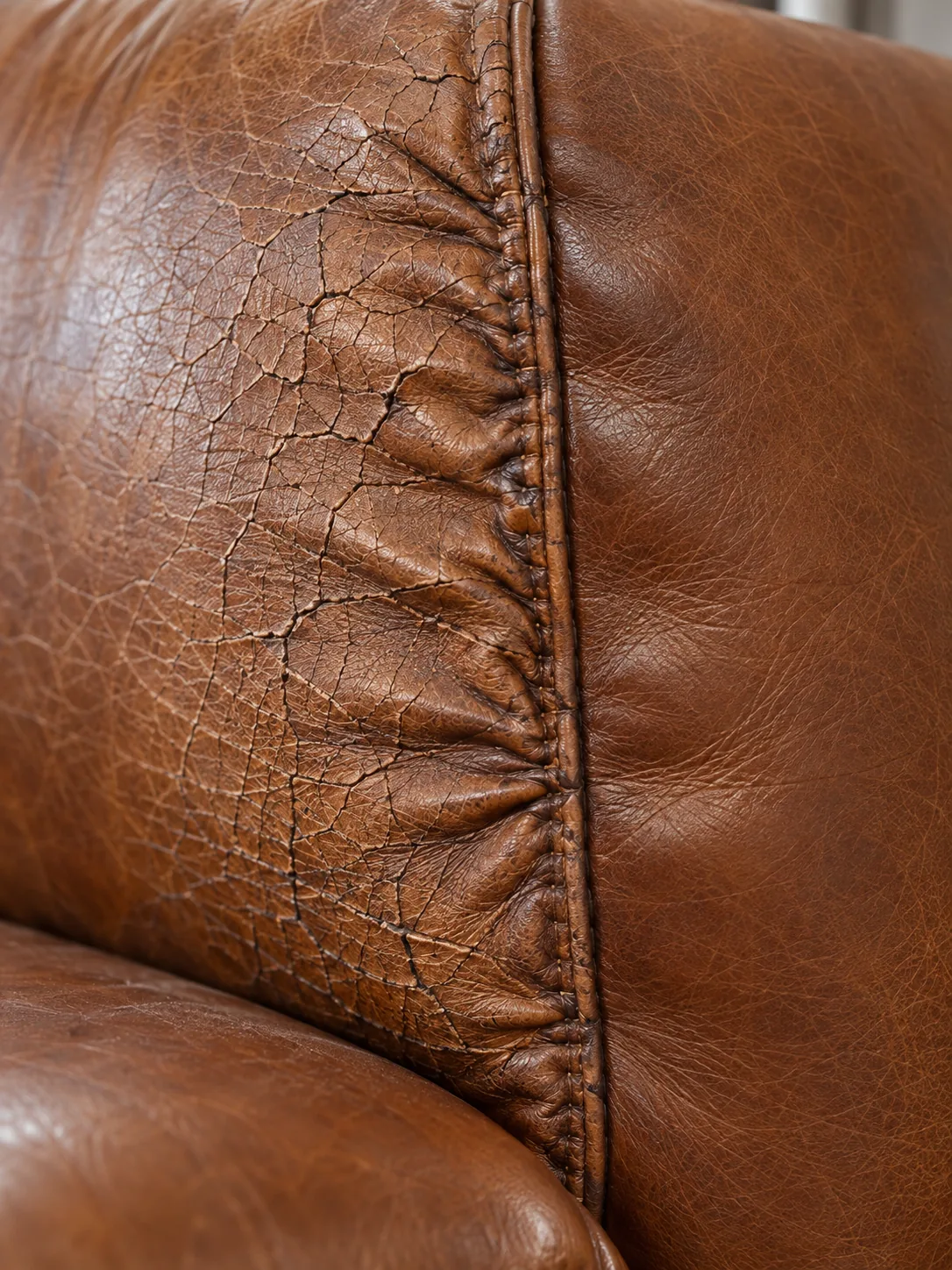 Leather cracked and shrunk by heat near a fire