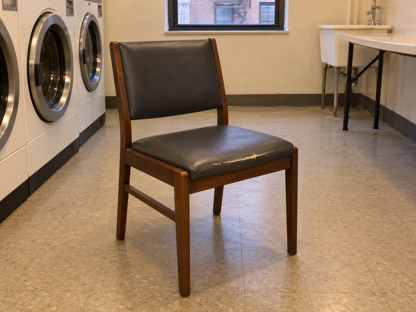 A laundry chair before repair