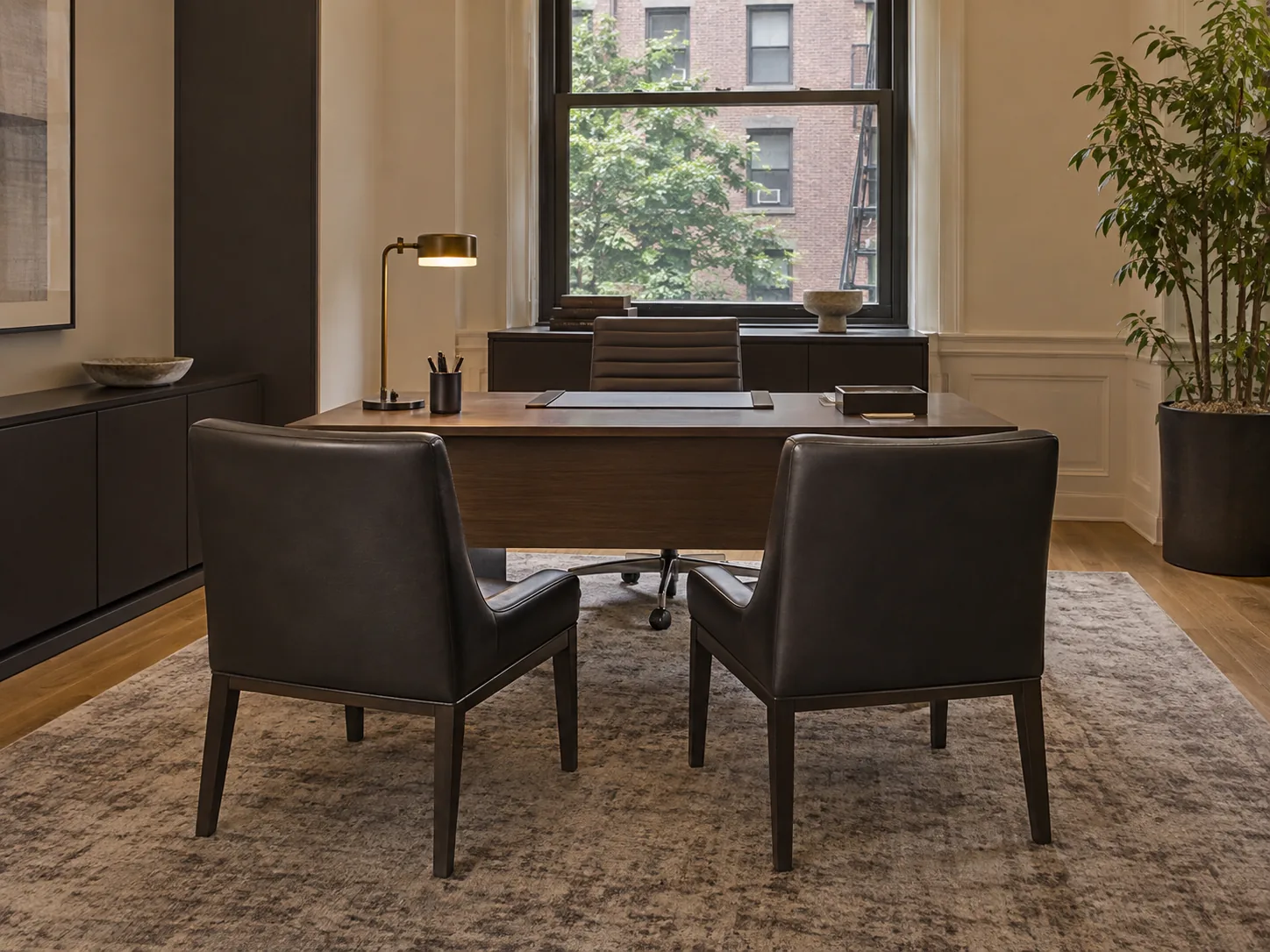 Leather guest chairs in a building leasing office