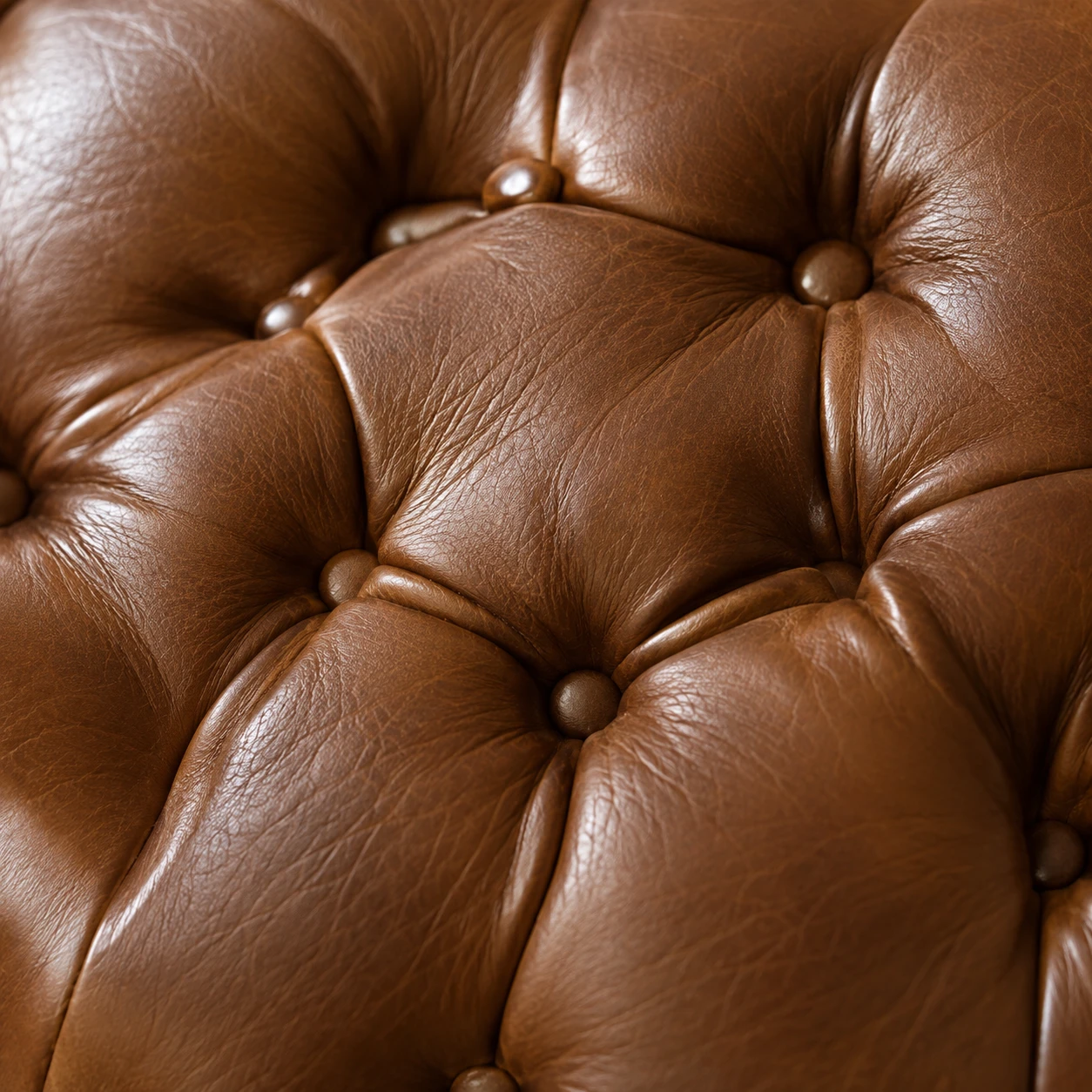 Leather chair with hand tufting
