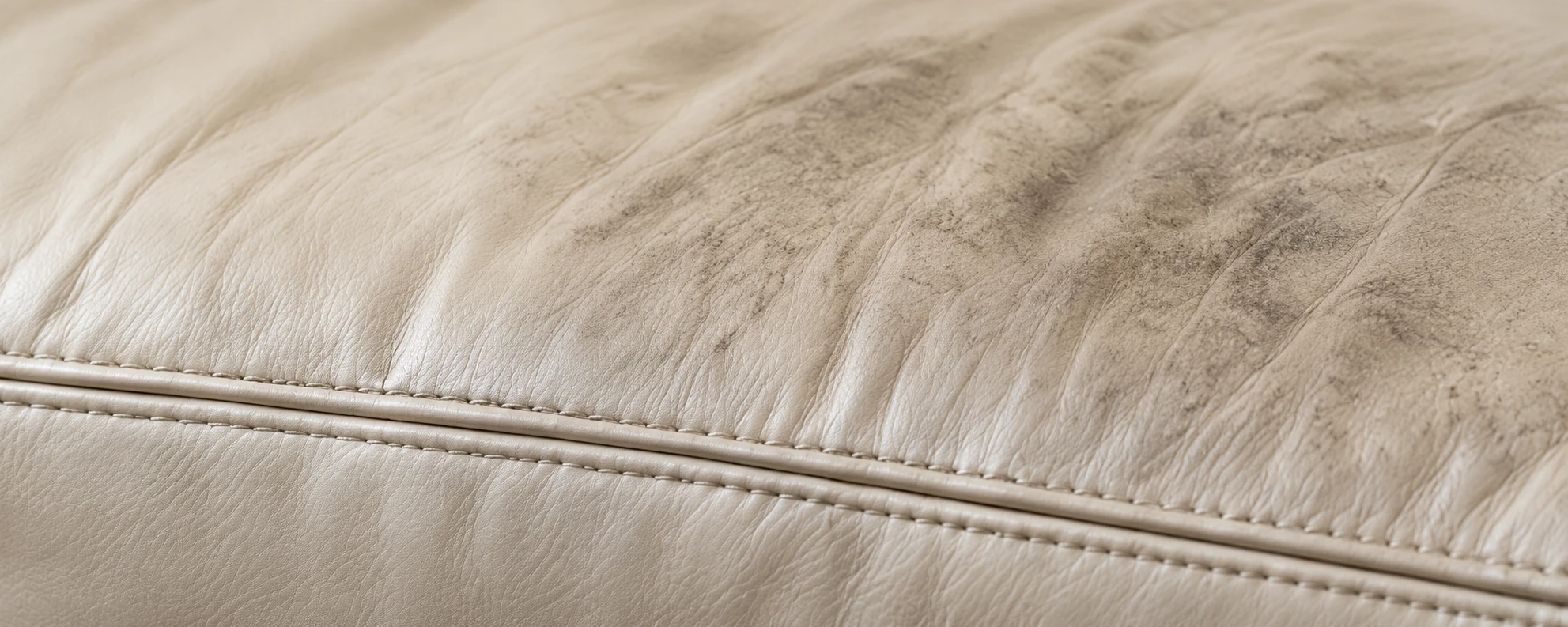 Soiled cream cushion edge