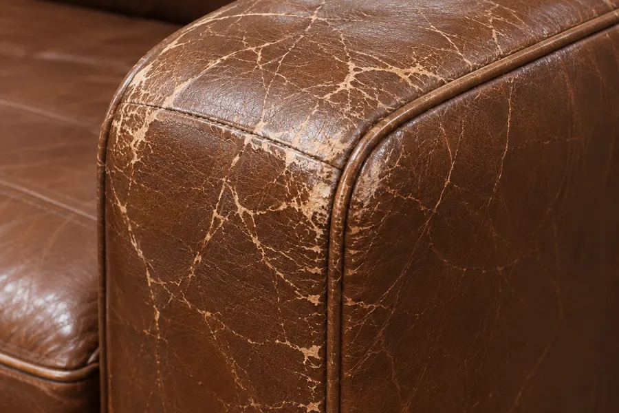 Cracked leather on top of an arm
